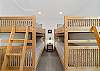 Upstairs bunk room with 2 sets of bunks