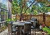Outdoor garden area with fire table with heat lamp, Gas BBQ