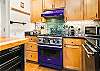 Chef's dream Viking Gas range, Breakfast Bar, Dishwasher, Microwave and open living space. 