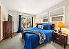 King bedroom with access to the back yard and deck, streaming TV, Master bath with Jacuzzi tub. 