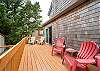 Back deck off of Master bedroom with lounge chairs.