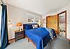 King bedroom with access to the back yard and deck, streaming TV, Master bath with Jacuzzi tub. 