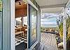 Access to deck off the dining area. With ocean facing fire pit and hot tub