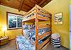 Kids room with double size bunk beds and a double trundle