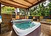 Fenced back yard garden with firepit, hot tub, sauna, covered outdoor dining area