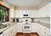 Large open kitchen with breakfast bar area