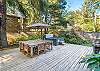 Back deck with hot tub, picnic table, umbrella, gas BBQ. 