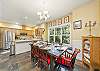 Open kitchen and dining area with double sided wood fireplace