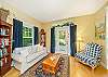 Sitting room with access to Kitchen, back deck with outdoor seating, hot tub and gas bbq