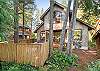 Back yard area with private hot tub and view of the golf course.