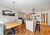 Dining and fully equipped kitchen with Viking stove/range. 