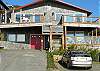 Triplex- Left 2 story side is the Neahkahnie unit and the lower right side is the condo Salish. 