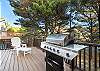 Wrap around deck with Gas BBQ, outdoor furniture, outdoor fireplace, and Adirondack chairs