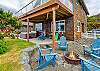 Outdoor firepit and New hot tub, with fenced in hard, and upper deck has wind protected deck with fire table and out door seating