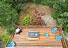 Back deck with picnic table. Perfect for puzzles, dominos etc. Adirondack chairs for lounging and gas BBQ for outdoor grilling. 