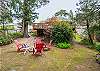 Back yard area with outdoor firepit. Perfect for making smores and star gazing. 