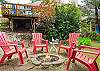 Back yard area with outdoor firepit. Perfect for making smores and star gazing. 