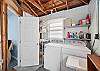 Washer and Dryer laundry room with access to the back yard.