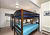 Bunk room with 2 bunks, 1/2 bath with toilet and sink, 1/2 bath with Shower, Cable TV. 