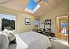 Upstairs Queen bedroom with desk work space, Overhead fans. 