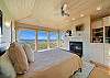 Master Bedroom with spectacular ocean views, gas fireplace, luxury linens, overhead fans, desk workspace. attached master bath with Jacuzzi tub, double sinks, nespresso coffee station. 