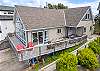 Ocean View deck on main level with outdoor seating and Gas BBQ.