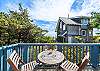  Ocean view deck, outdoor fire table, and bistro table and chairs. 