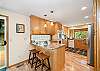 Gourmet kitchen with breakfast bar and open to the dining room. 