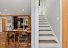 Stairs to the upper family suite bedroom with Queen and double bunk beds.