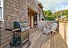 Front deck with gas BBQ, lounge chair 