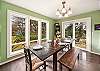 Dining room open to the fully equipped kitchen