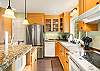 Fully equipped kitchen with breakfast bar