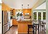 Fully equipped kitchen with breakfast bar