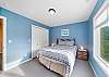 Upstairs queen bedroom with golf course view. 