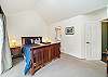 Master bedroom with queen bed, sliding door to back yard, private bath with jacuzzi tub, walk in shower, large walk in closet and double sinks. 