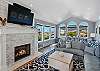 Living room with smart TV, Gas fireplace, ocean view, reading nook 