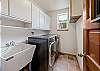 Laundry room with Washer Dryer and utility sink 