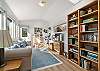 Upstairs family room with streaming tv, DVD player, video library and book library with access to the upper deck