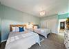 2nd lower bedroom with 2 queen beds and streaming TV