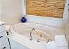 Master bath with jetted tub
