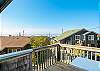 oceanview deck off of the dining room with outdoor seating 