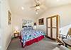 Family suite with King bed that is accessed through the queen bedroom. Access to the back deck with gas BBQ