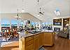 Kitchen with breakfast bar and ocean views. 