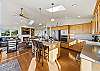 Fully equipped kitchen with island with breakfast bar. 