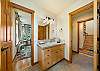 Main floor jack and jill bathroom that has access from King bedroom and the hallway with a tub shower combination. 