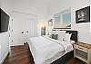 Master bedroom with streaming TV, private bath and access to the deck. 