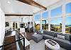 Open living space with spectacular views. Large comfy couch. Gourmet Kitchen with breakfast bar and dining area with access to deck. 