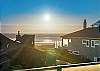Gorgeous Pacific Ocean sunsets from the large wrap around deck. 