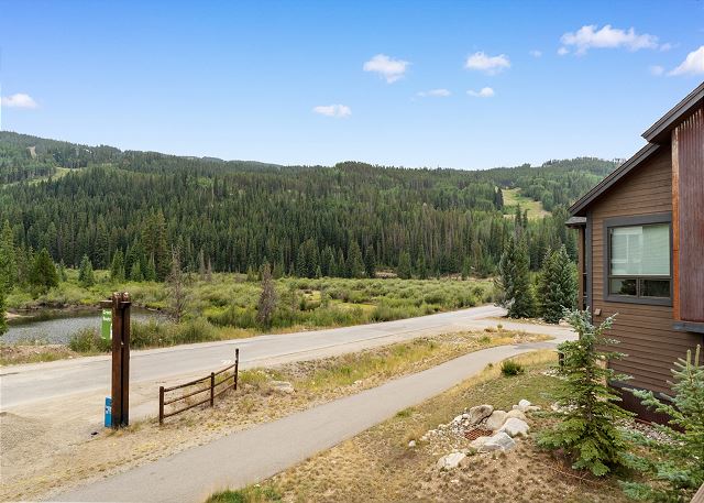 Private balcony with outdoor seating and mountain views!