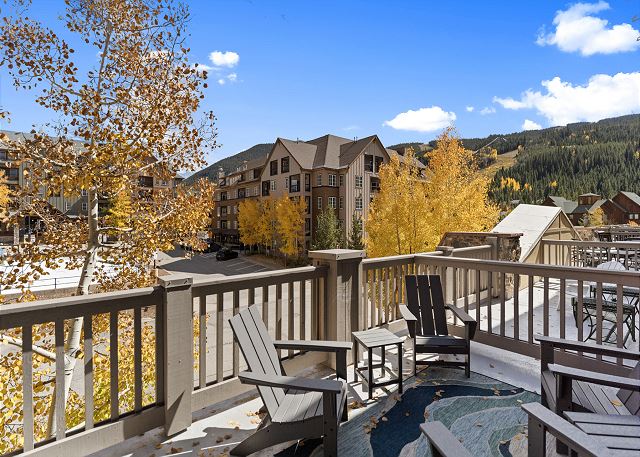 Spacious private balcony with outdoor seating overlooking Dercum Square!